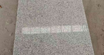 安顺芝麻白光面毛板