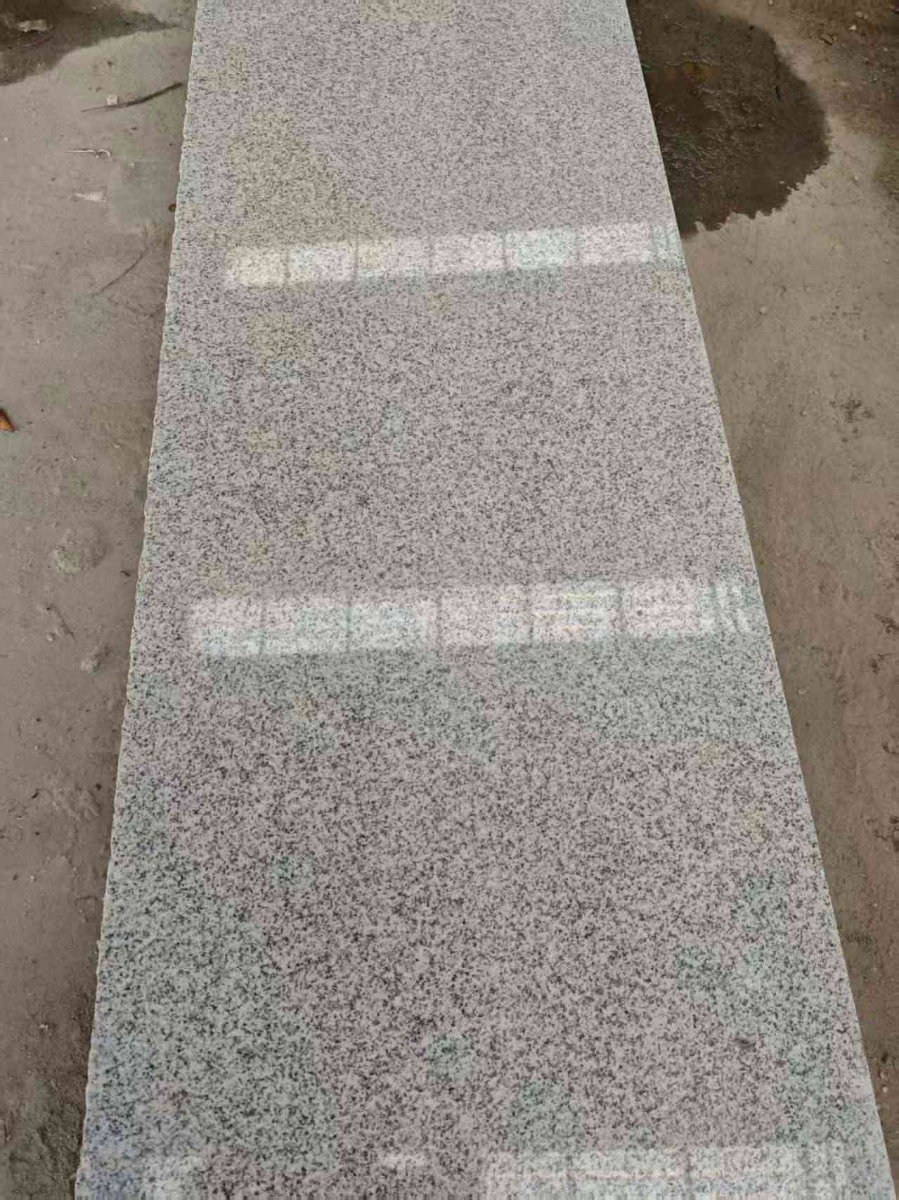 安顺芝麻白光面毛板